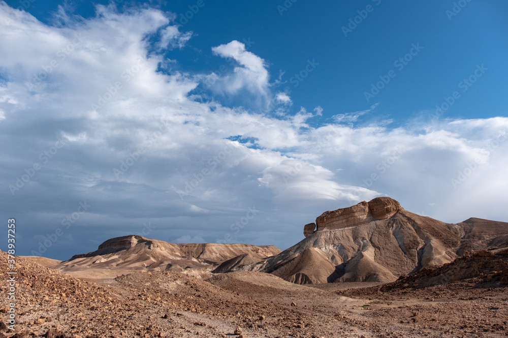 Panoramic landscape of the remote part of the Judean Desert, Israel. Sandstone hills, natural terraces with escarpments and dry wadies of the Judean Desert.