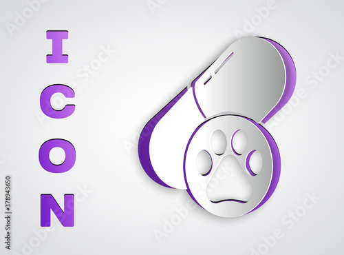 Paper cut Dog pill icon isolated on grey background. Prescription medicine for animal. Paper art style. Vector.