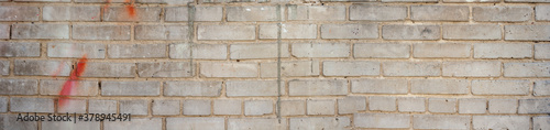 White brick wall texture panoramic. White gray light damaged rustic brick wall texture banner panorama