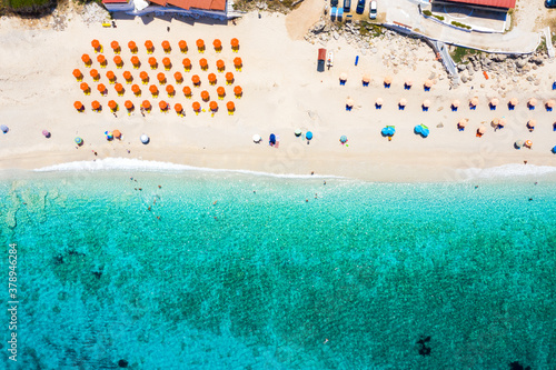 Aerial top down view to the popular Petani Beach on the Ionian island of Kefalonia, Greece, with turquoise sea