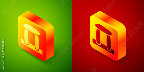 Isometric Stonehenge icon isolated on green and red background. Square button. Vector.