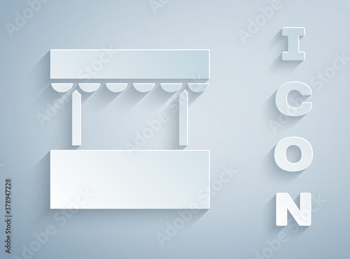 Paper cut Ticket box office icon isolated on grey background. Ticket booth for the sale of tickets for attractions and sports. Paper art style. Vector.