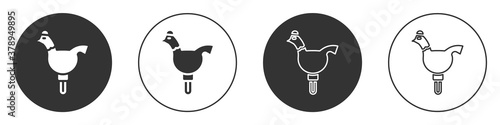 Black Candy cockerel lollipop on a stick icon isolated on white background. Circle button. Vector.