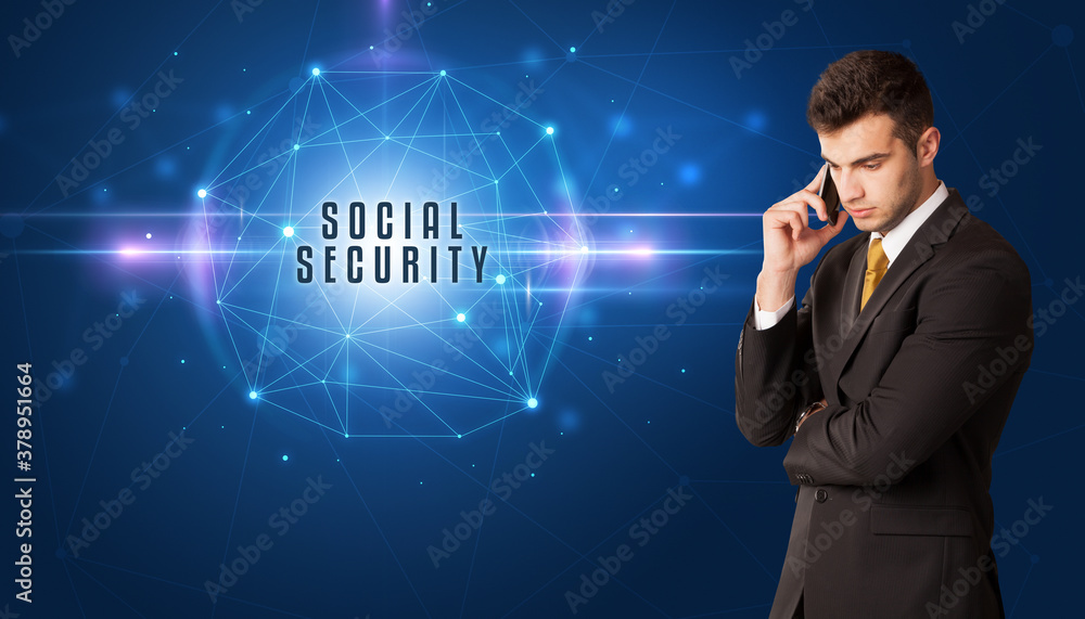 Businessman thinking about security solutions with SOCIAL SECURITY inscription Businessman thinking about security solutions with SOCIAL SECURITY inscription