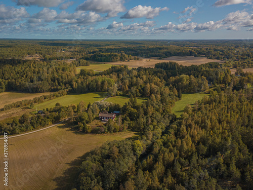 Aerial landscape, countryside, forest and fields. Finnish landscape, Scandinavia. September drone photo