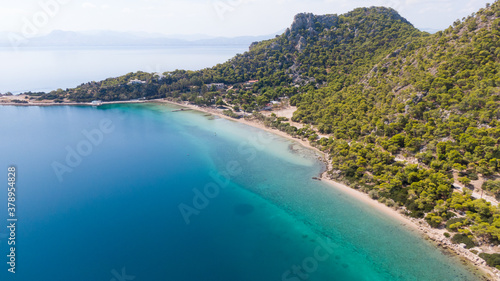 Aerial view on turqouise blue water and sandy beach of Limni Vouliagmeni or Ireon Lake, Peloponnese, Greece   © Maciej