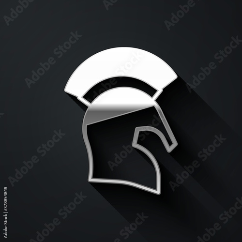 Silver Greek helmet icon isolated on black background. Antiques helmet for head protection soldiers with a crest of feathers or horsehair. Long shadow style. Vector.
