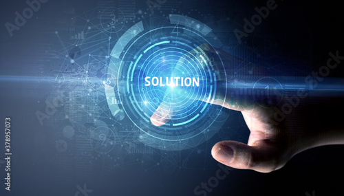 Hand touching SOLUTION button, modern business technology concept