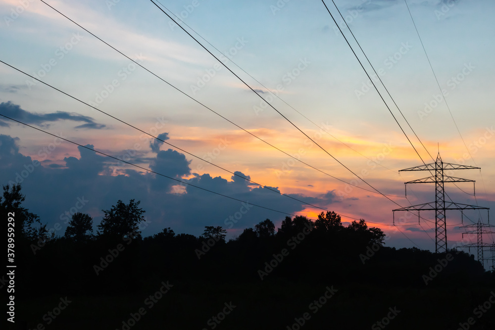 sunset over electric line