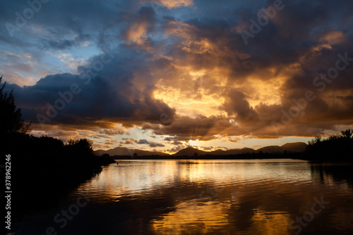 Mirrored view of Marapendi Lagoon sunset, Barra da Tijuca, Rio de Janeiro, Brazil photo