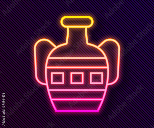 Glowing neon line Ancient amphorae icon isolated on black background. Vector.