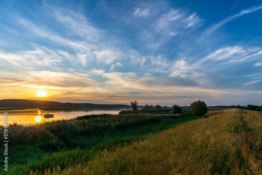 Fototapeta premium Sunrise over the River Oder, german-polish border
