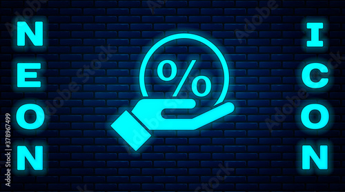 Glowing neon Discount percent tag icon isolated on brick wall background. Shopping tag sign. Special offer sign. Discount coupons symbol. Vector Illustration.