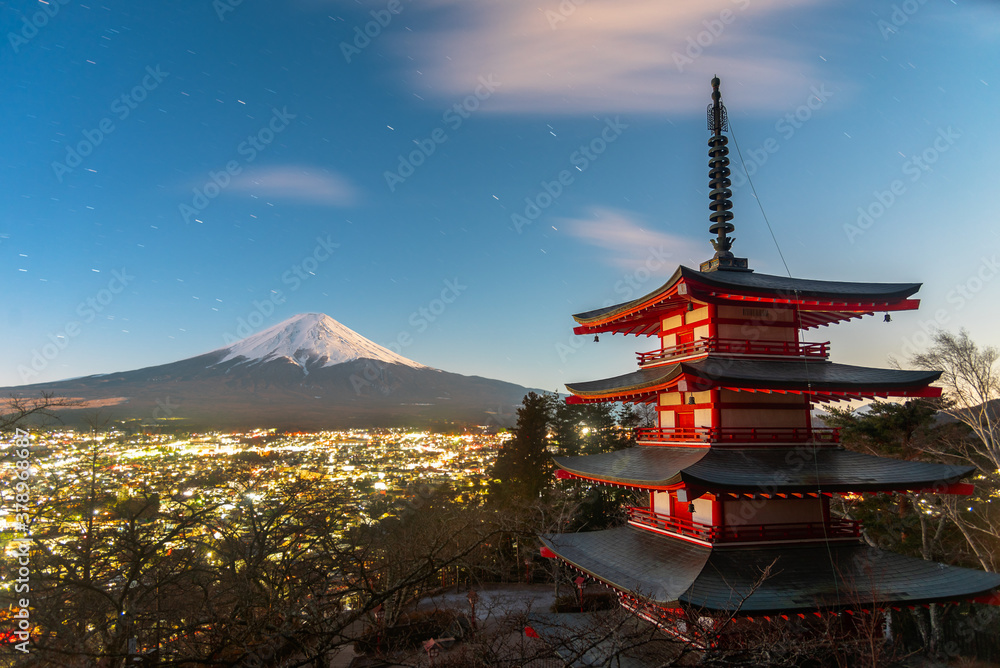 Night landscape  View of Mount Fuji with the Chureito Pagoda of Asakura Sengen shrinein winter   during sunset magic hour in winter  Fujiyoshida, Japan.
