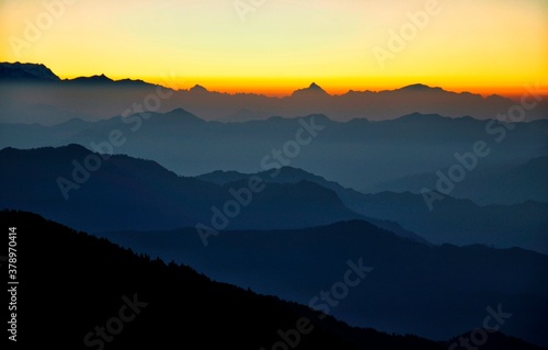 Sunrise with some of the Highest Peaks (Mt. Nanda Devi, Mt. Dronagiri and Mt. Trishul) situated in the Uttarakhand state of India. Picture clicked from Churdhar, Sirmour, Himachal Pradesh, India © Surjeet