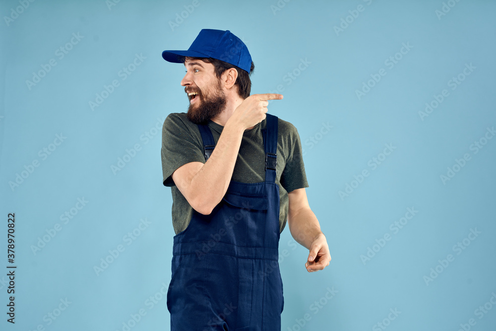 Fototapeta premium Man in working uniform emotions in life delivery service work