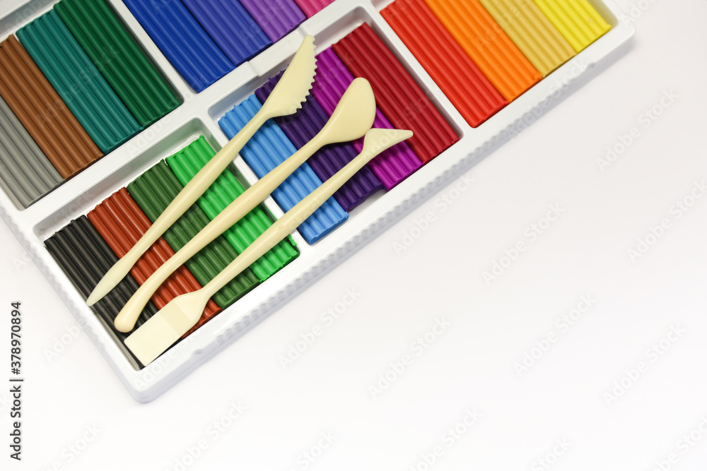 colorful new plasticine on white background colorful new plasticine on white background