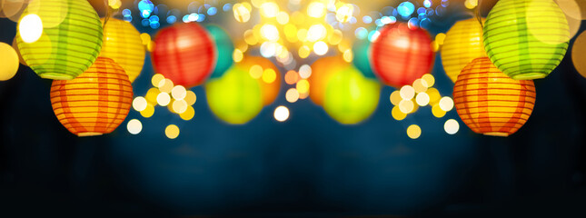 Festive background with colorful lights garland and bright bokeh. Holiday light decor. Celebration concept.