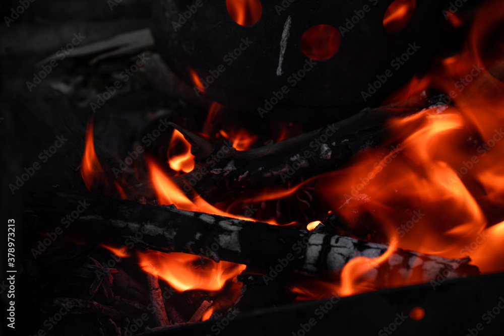 Close-up burning woods and flames Close-up burning woods and flames
