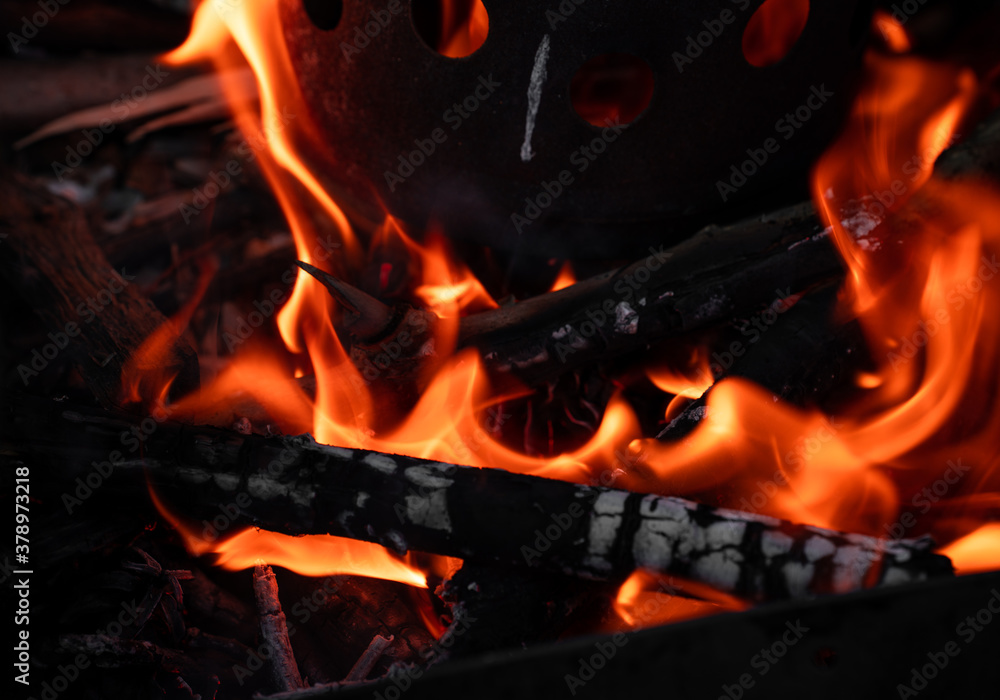 Close-up burning woods and flames Close-up burning woods and flames