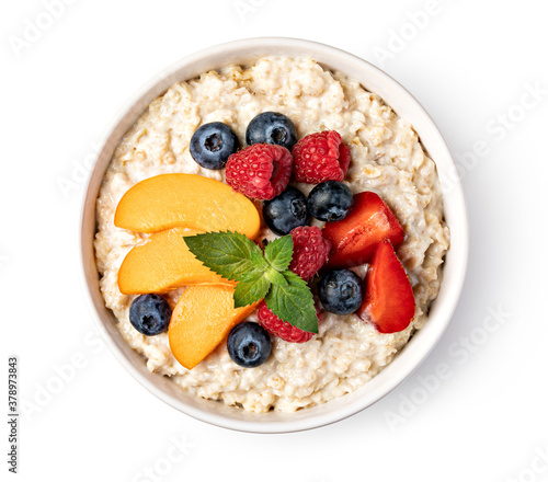 prepared oatmeal with fruits and berries