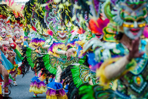 Colorful masks of street dacnce parade performer during Masskara Festival at Bacolod City, Philippines