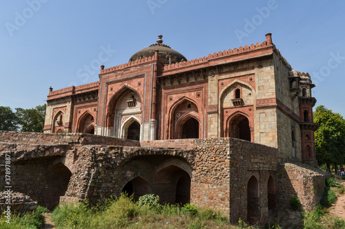 A mesmerizing view of architecture of main tomb at old fort from side lawn.