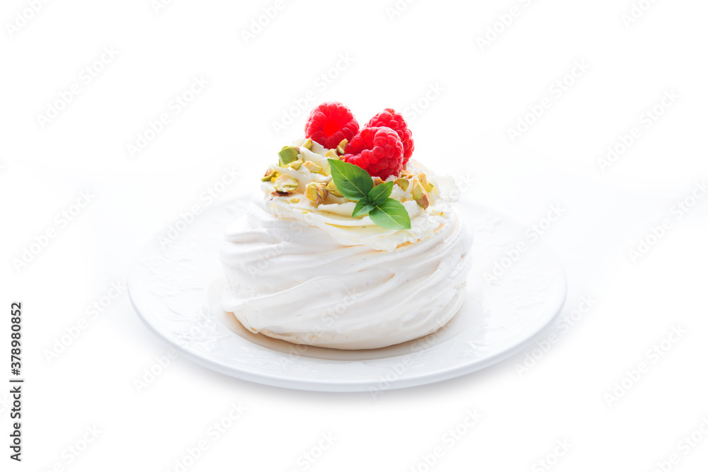 dessert Anna Pavlova with raspberries and cream on a saucer dessert Anna Pavlova with raspberries and cream on a saucer