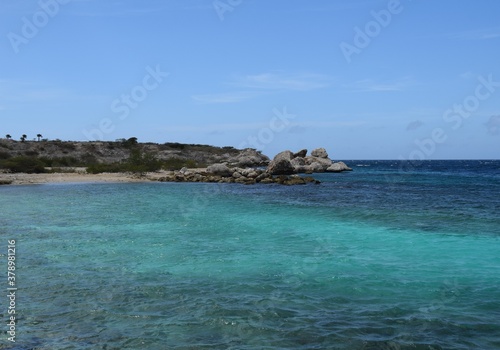 Rocks and turquoise water in the Caribbean sea blue sky coastal landscape along the Curacao coastline