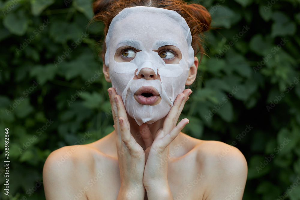 Fototapeta premium Portrait of a girl face mask Touch your face with your hands clear skin