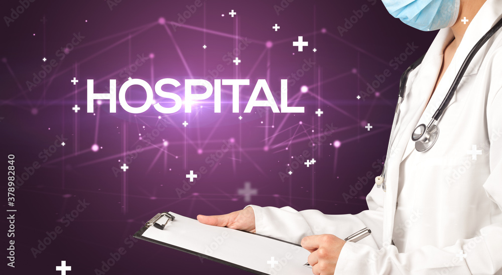 Doctor fills out medical record with HOSPITAL inscription, medical concept Doctor fills out medical record with HOSPITAL inscription, medical concept