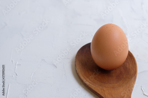 Egg On Wood Spoon Abstract Minimal Background 
