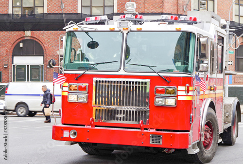 New York City fire department truck on the street in Manhattan in bright red photo