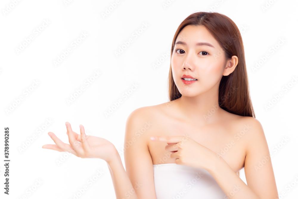 Beauty spa female with perfect skin portrait. Beautiful Asian spa woman showing empty copy space on beauty open hand palm for text. Proposing some product. Gesture for advertisement. white background Beauty spa female with perfect skin portrait. Beautiful Asian spa woman showing empty copy space on beauty open hand palm for text. Proposing some product. Gesture for advertisement. white background