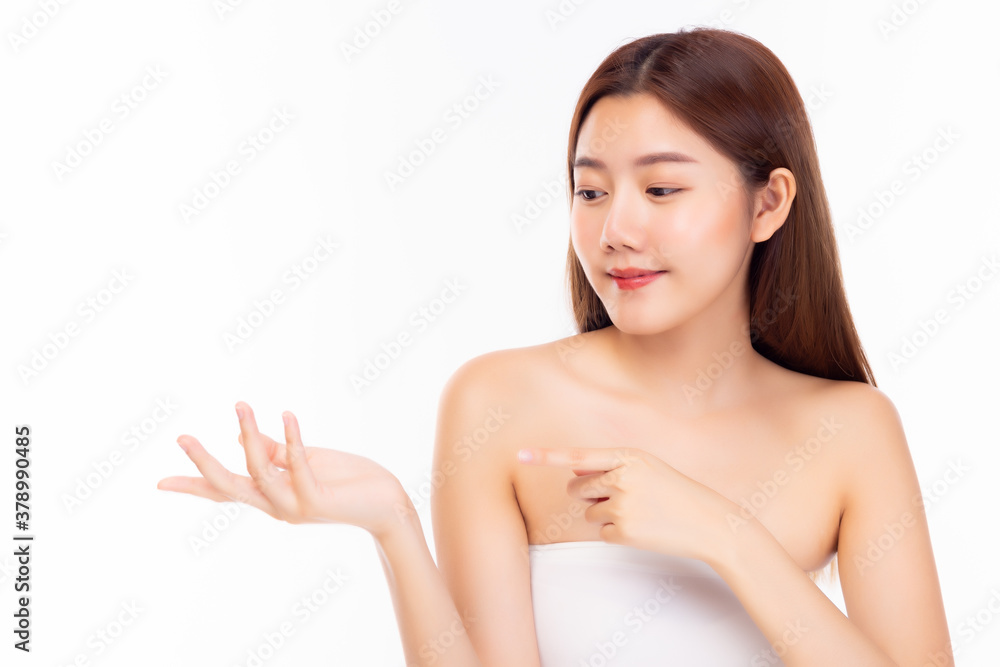 Beautiful Asian spa woman showing empty copy space on beauty open hand palm for text. Beauty spa girl with perfect skin portrait. Proposing some product. Gesture for advertisement. white background Beautiful Asian spa woman showing empty copy space on beauty open hand palm for text. Beauty spa girl with perfect skin portrait. Proposing some product. Gesture for advertisement. white background