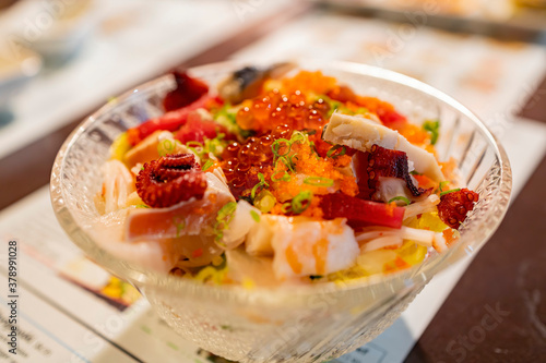 Close up shot of a seafood Sashimi bowl