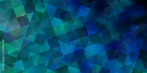Light BLUE vector pattern with polygonal style with cubes.