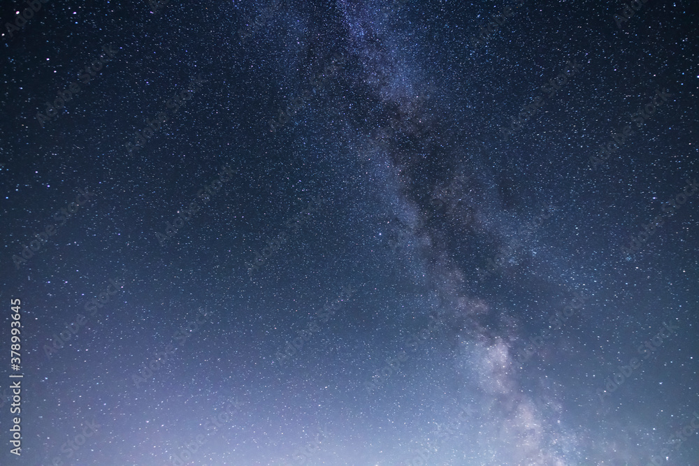 Fototapeta premium Beautiful starry sky with bright milky way galaxy. Night landscape. Astronomical background.