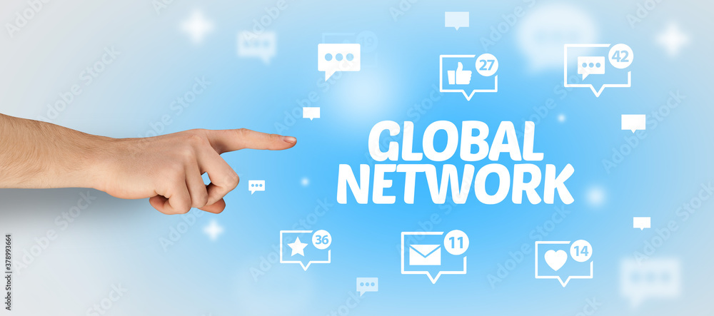 Close-Up of cropped hand pointing at GLOBAL NETWORK inscription, social networking concept