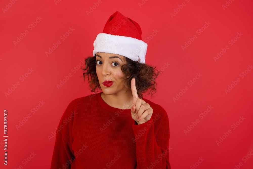 Woman gesturing a no sign. Closeup portrait unhappy, serious girl raising finger up saying: oh no you did not do that. Standing over yellow background. Negative emotions facial expressions, feelings. Woman gesturing a no sign. Closeup portrait unhappy, serious girl raising finger up saying: oh no you did not do that. Standing over yellow background. Negative emotions facial expressions, feelings.