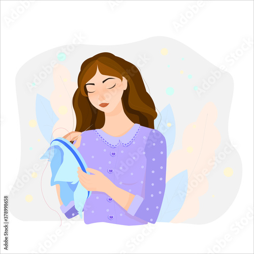 Nice young girl. The woman is engaged in needlework. The girl is embroidering. embroidery, manual labor, hobbies and interests