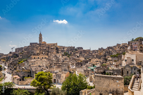 Matera, Basilicata, Italy - Panoramic view of the Civita and the Sasso Barisano. The ancient houses of stone and brick, carved into the rock. The Sassi of Matera. © Ragemax