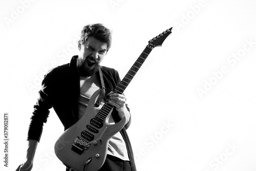 Musician with guitar rock star emotions entertainment modern performer