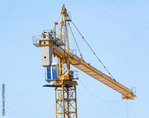 Wallpaper Mural yellow construction crane tower on background sky Torontodigital.ca