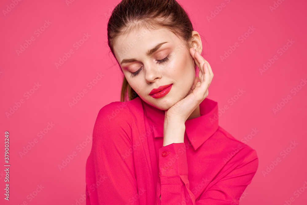 attractive girl in pink shirt cropped view bright makeup red lips gesturing with hands Copy Space attractive girl in pink shirt cropped view bright makeup red lips gesturing with hands Copy Space
