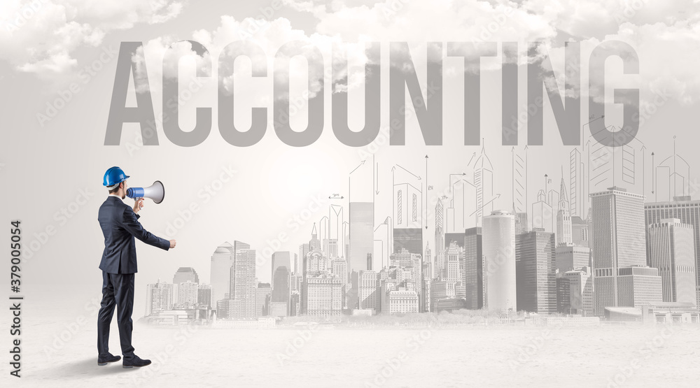 Young businessman with hard hat and ACCOUNTING inscription, new business opportunity concept Young businessman with hard hat and ACCOUNTING inscription, new business opportunity concept