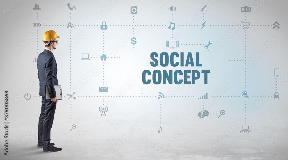 Engineer working on a new social media platform with SOCIAL CONCEPT inscription concept Engineer working on a new social media platform with SOCIAL CONCEPT inscription concept