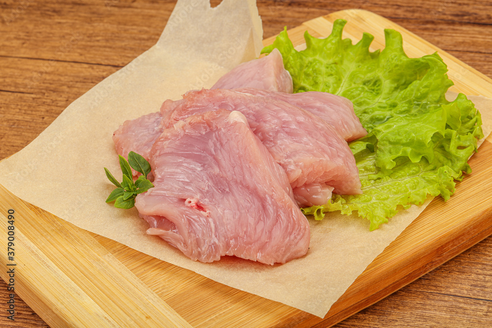 Raw turkey breast steak for cooking Raw turkey breast steak for cooking