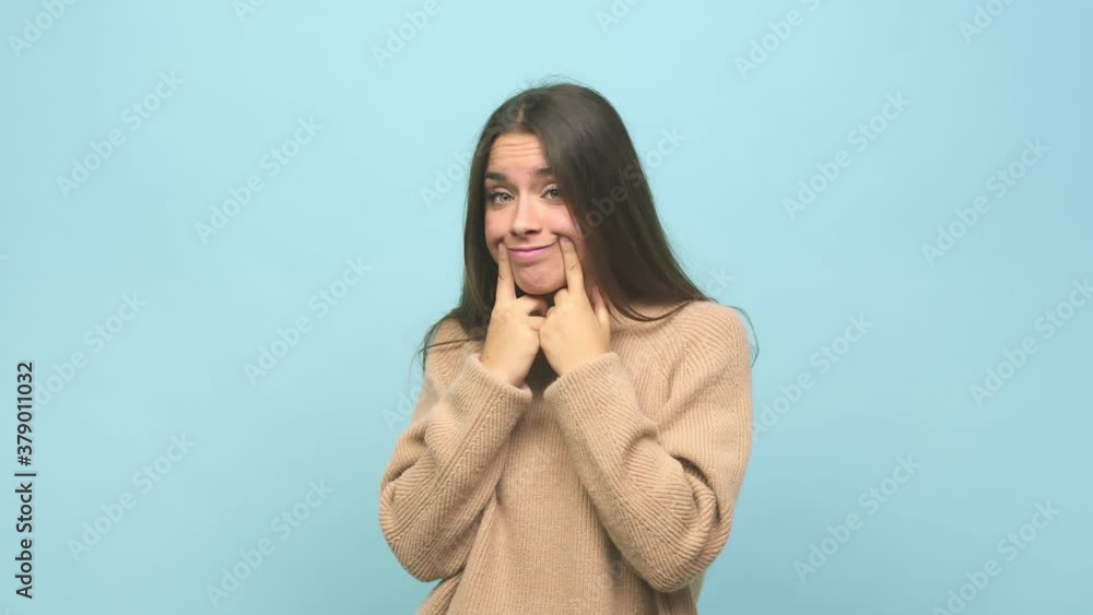 Young cute woman doubting between two options Young cute woman doubting between two options