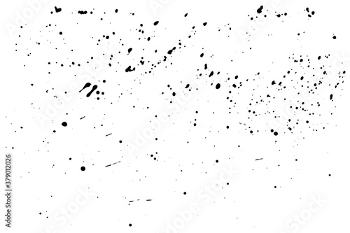 Paint splatter vector dust texture. Black ink grunge spray effect on white background. Messy dirt distress overlay. © Veronica
